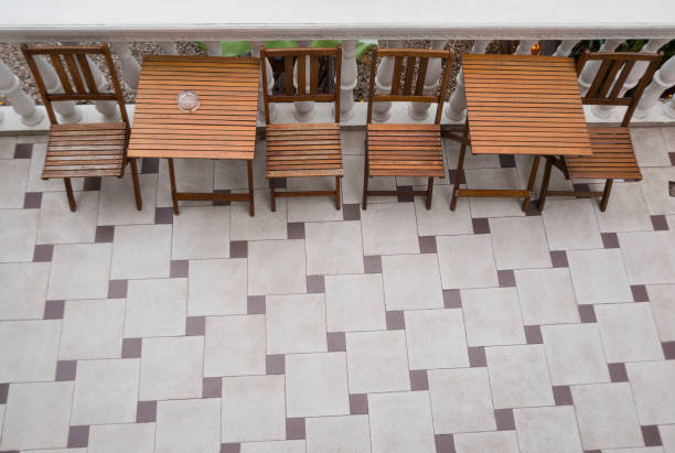 istock Table and chairs on the stone floor 1309285495