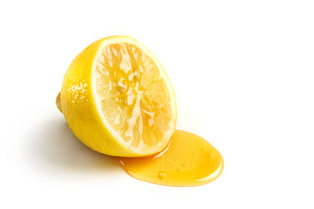 istock Honey flows down from a glaze of lemon. 1309285753