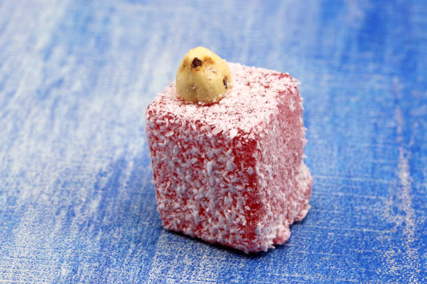 istock Turkish delight on blue wooden background 1309287198