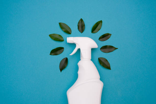 istock Plastic spray bottle for safe cleaning and green leaves 1309288491