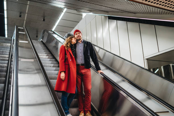 istock Couple in love on subway escalator 1309291548