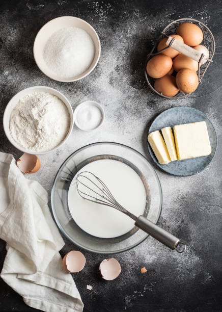 istock Ingredients for cooking: milk, sugar, flour, eggs, salt, butter. Cooking time 1309292832