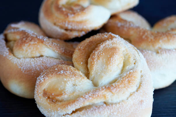 istock Pastries made from yeast dough with sugar sprinkles 1309293555