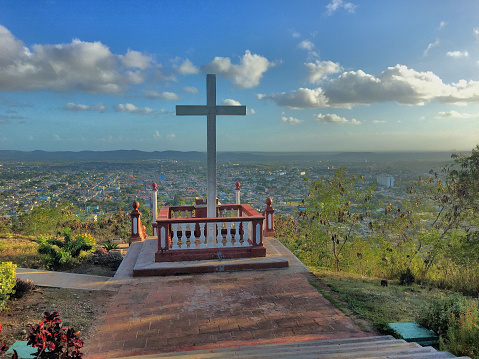 Catholic cross on a hill with a fantastic view in Holguin in Cuba December 28,2016