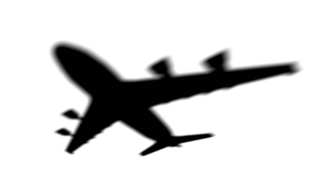 Airplane shadow on a white background. Airplane shadow isolated. High quality photo