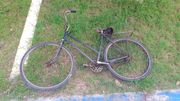 istock an old bicycle that was left in the park 1309311630