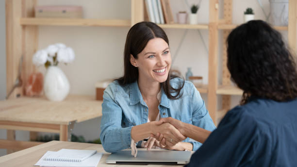 istock Banner view of smiling colleagues handshake at meeting 1309314970