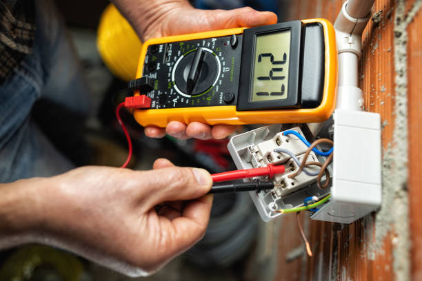 istock Electrician at work on a residential electrical system. Electricity. 1309317613