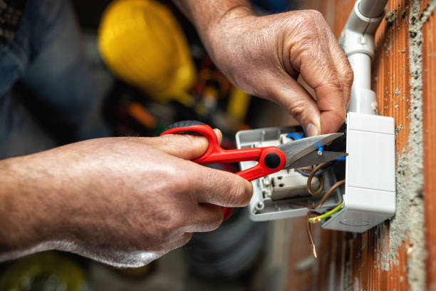 istock Electrician at work on a residential electrical system. Electricity. 1309317614