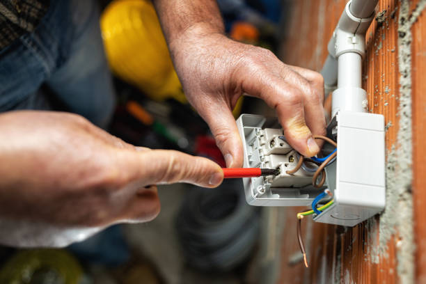 istock Electrician at work on a residential electrical system. Electricity. 1309317619