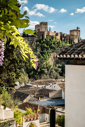 Panoramic view of the historic city of Toledo, a UNESCO World Heritage Site and the Tagus River surrounding it from the Moorish King's Stone, well-known viewpoint of the city on a sunny day. Spain tourism concept
