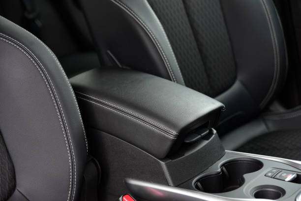 istock Armrest in the luxury passenger car between the front seats 1309323080