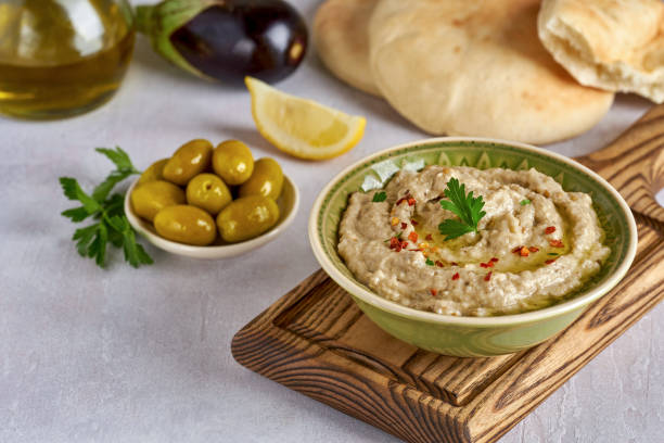 istock Eggplant Aubergine dip Baba Ghanoush. Traditional vegan arabic eggolant appetizer mutabbal . Close up 1309323252
