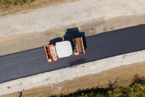 istock Aerial view of new road construction with steam roller machine at work. 1309324176