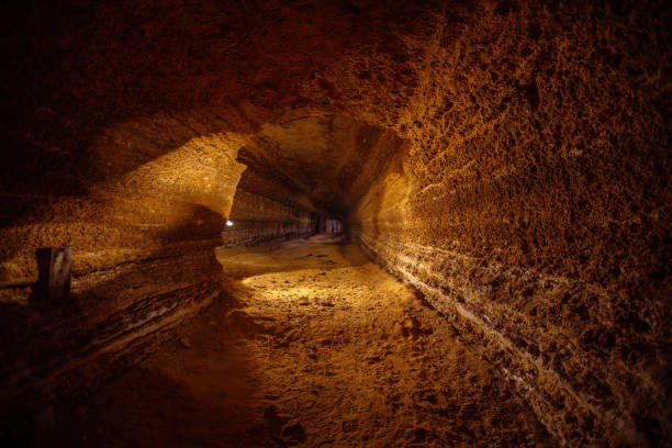 istock Abandoned prospecting adit. Tunnel at limestone at abandoned mine 1309326487