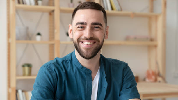 istock Wide view portrait of smiling man have video call 1309328821