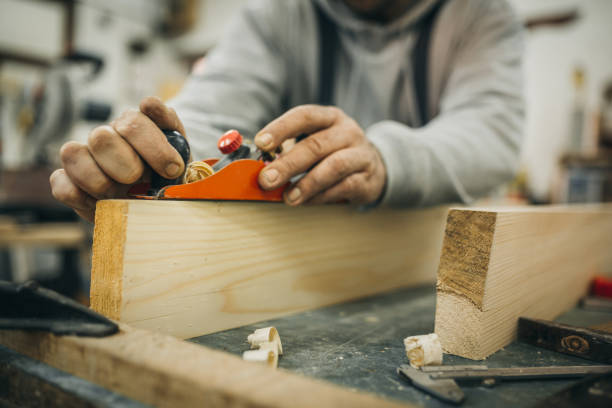 istock Carpenter Working In His Old-Fashion Workshop 1309330203