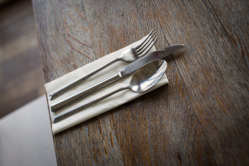 Set table with silver cutlery