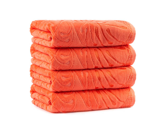 istock terry bath towels, rolled up and spread out, isolate on a white background 1309335194