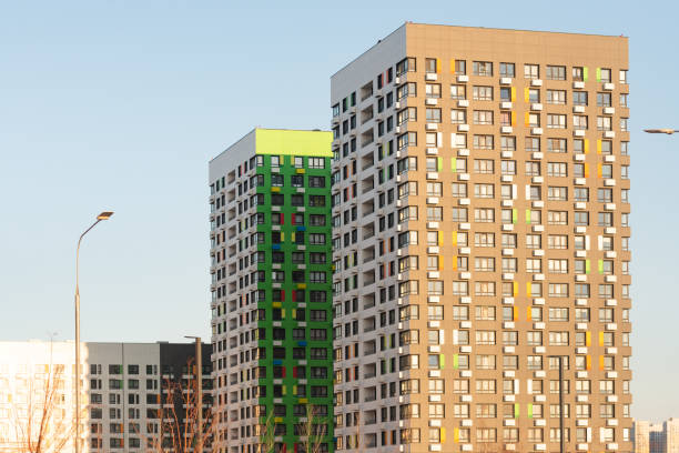 istock High-rise buildings under the bright sun 1309338440