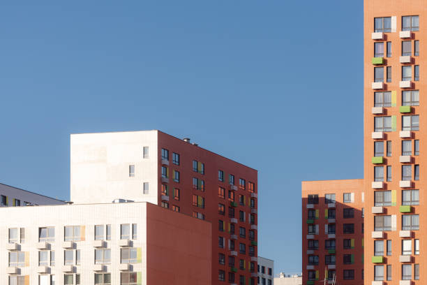 istock High-rise buildings under the bright sun 1309338499