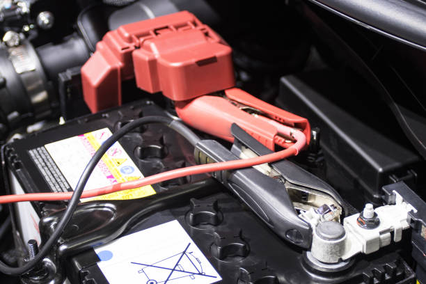 istock jumper cables for charging vehicle battery Identify the positive and negative terminals Essentials to Keep in Your Car 1309353144