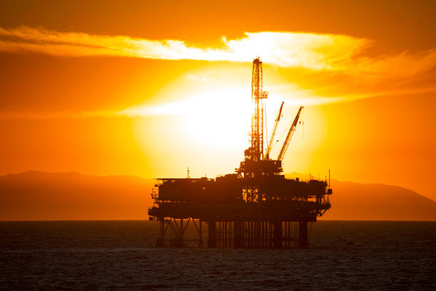 istock Oil Rig Blazing Sun 1309354587