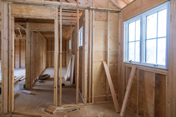 istock Construction home framing on residential beam framework wooden new house 1309358799