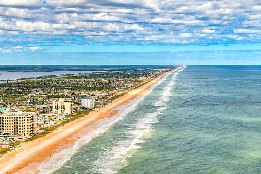 Aerial view of the coastline of beautiful Ormond Beach, Florida from an altitude of about 1000 feet over the Atlantic Ocean.