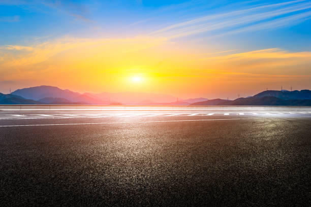 istock Country road and mountain in summer at sunset. 1309362855