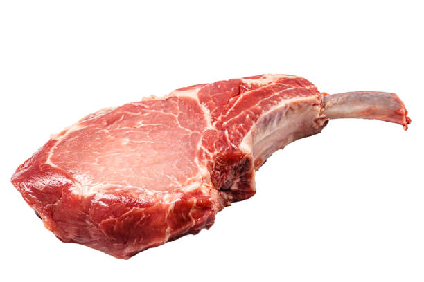 Tomahawk raw steak on a white background. Isolated. Tomahawk raw steak on a white background. Isolated. rib eye steak stock pictures, royalty-free photos & images