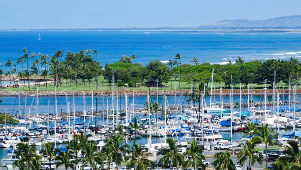 istock Yacht harbor in Hawaii and Magic Island in the background 1309376183