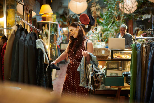 istock vintage clothing store customer 1309387000