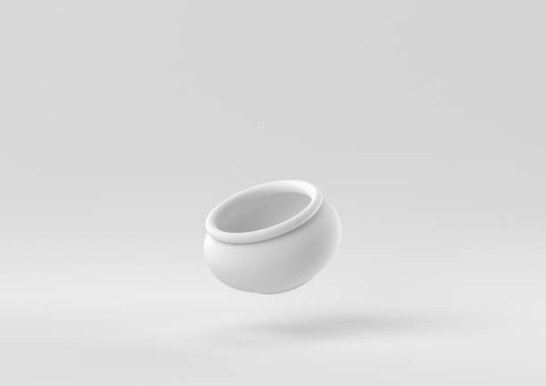 istock White pottery floating in white background. minimal concept idea creative. monochrome. 3D render. 1309387066