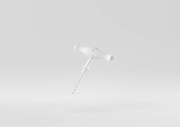 istock White Wine corkscrew with wooden handle floating in white background. minimal concept idea creative. monochrome. 3D render. 1309387073