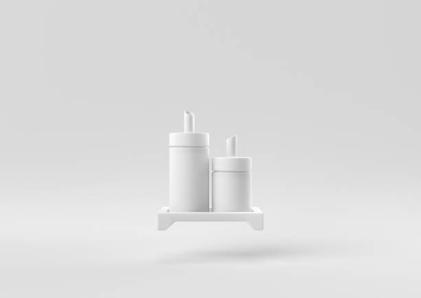 istock White Condiment bottles floating in white background. minimal concept idea creative. monochrome. 3D render. 1309387104
