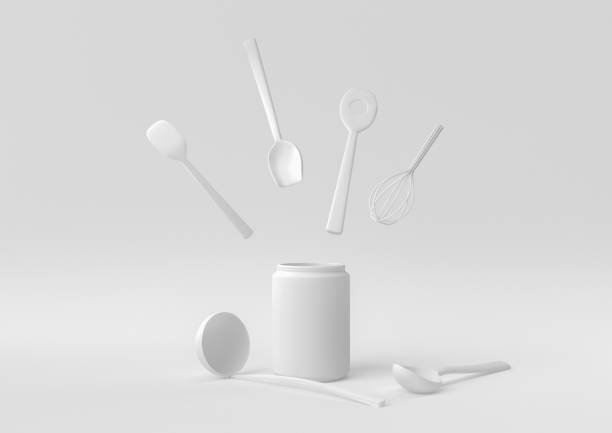 istock White Kitchen utensils and baking ingredients floating in white background. minimal concept idea creative. monochrome. 3D render. 1309387250