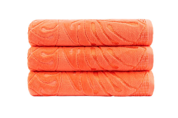 istock terry bath towels, rolled up and spread out, isolate on a white background 1309389416