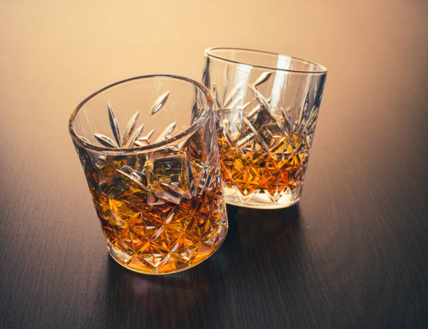 istock alcoholic drink, whiskey in glasses 1309392421