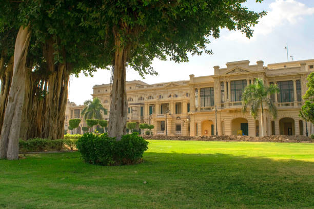 Beautiful view of Abdeen palace and garden during day in the Africa capital city Cairo, luxury district. Green park with no people infront of the Abdeen Palace stock photo