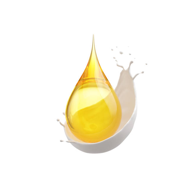 istock Golden oil drop on milk cream 1309395770