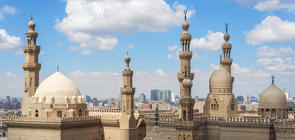 Aerial day shot of minarets and domes of Sultan Hasan mosque and Al Rifai Mosque, Old Cairo, Egypt