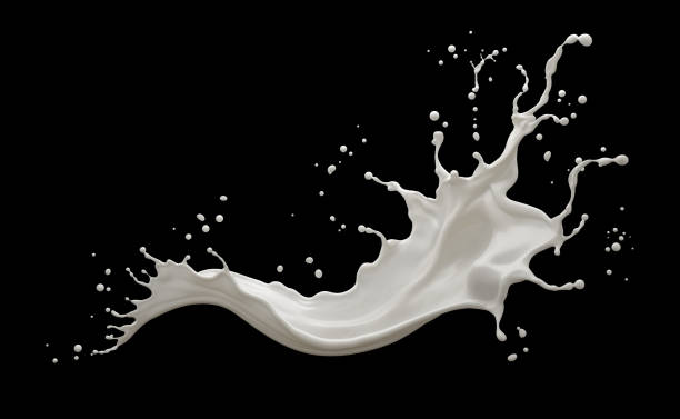 salpicadura de leche aislada en el fondo - milk fotografías e imágenes de stock