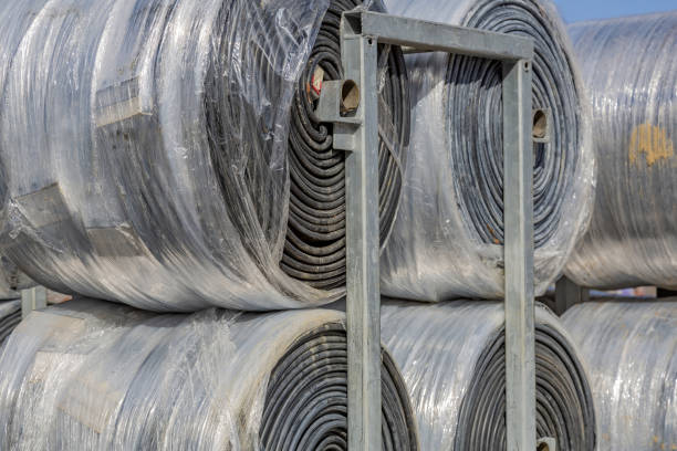 istock Huge industrial rolls of roofing material in protective cellophane 1309397011