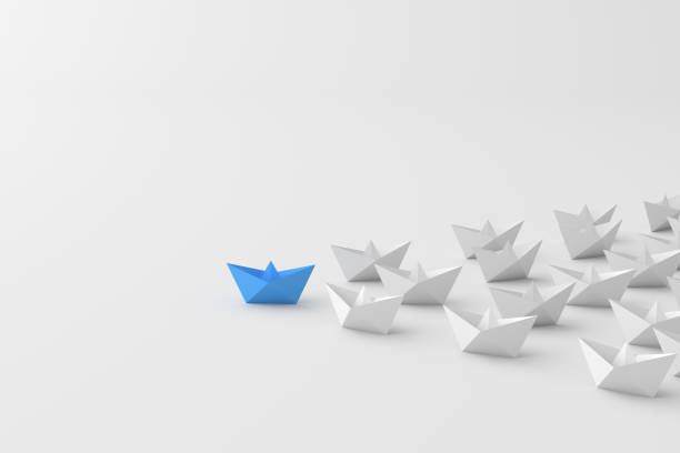 istock Leadership concept, blue leader boat leading white boats, on white background with empty copy space 1309397761