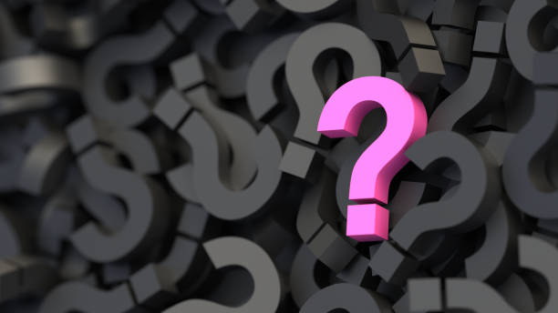 istock Pink question mark on a background of black signs, FAQ Concept 1309398024