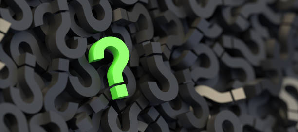 istock Green question mark on a background of black signs, FAQ Concept 1309398059
