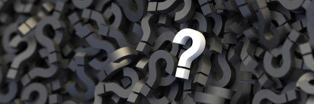 istock White question mark on a background of black signs, FAQ Concept 1309398172
