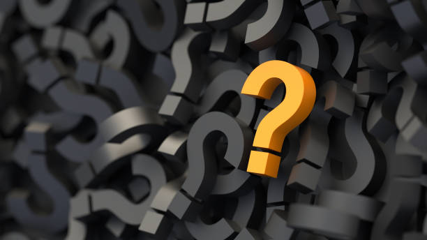 istock Orange question mark on a background of black signs, FAQ Concept 1309398185