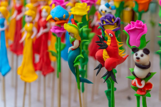 istock Chinese traditional street art - tiny sculpture figurines made from dough 1309400912
